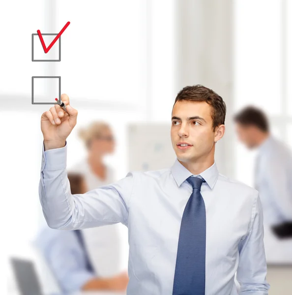 Attractive buisnessman or teacher with marker — Stock Photo, Image