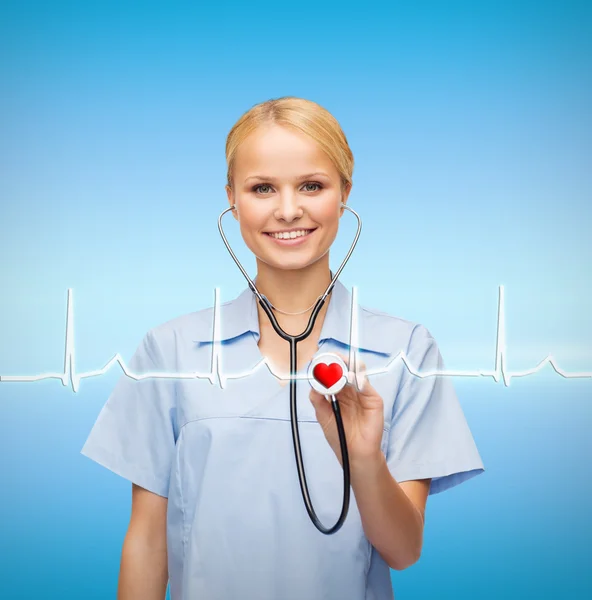 Smiling female doctor or nurse with stethoscope — Stock Photo, Image