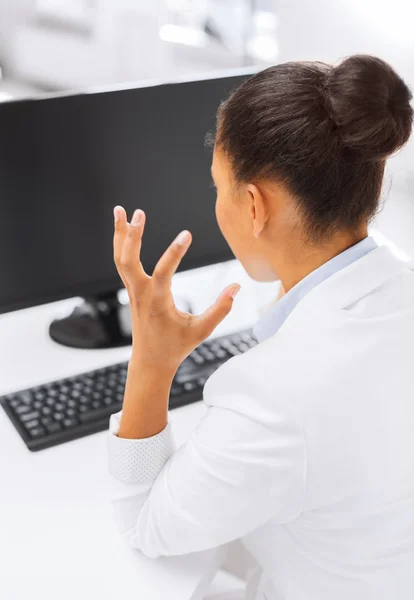 Stressed businesswoman with computer — Stock Photo, Image