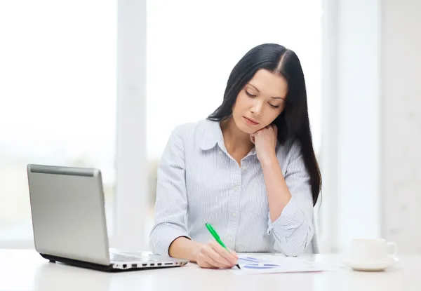 Tired businesswoman or student with laptop Royalty Free Stock Photos