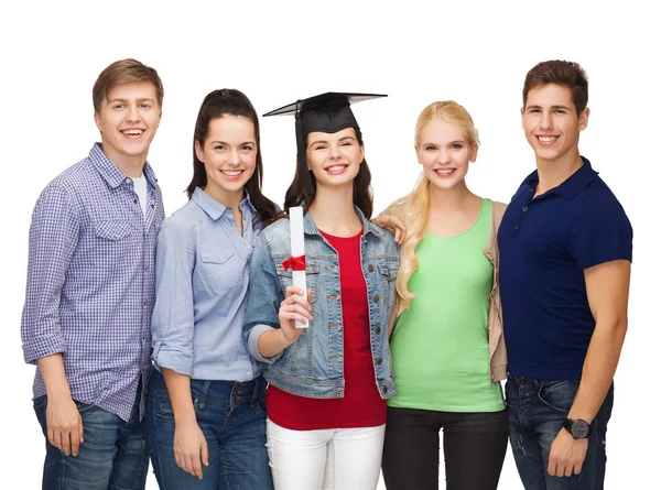 Group of standing smiling students with diploma — Stock Photo, Image