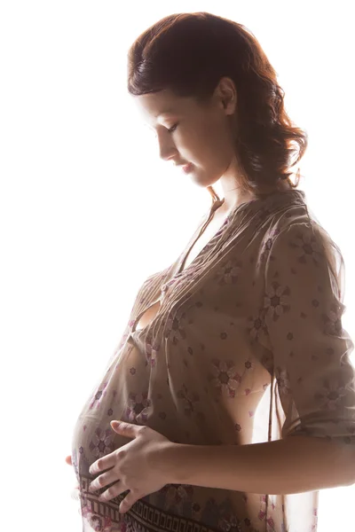 Silhouette Bild der schwangeren schönen Frau Stockfoto