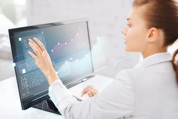 Smiling businesswoman with touchscreen in office — Stock Photo, Image