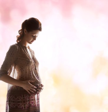 Silhouette picture of pregnant beautiful woman clipart