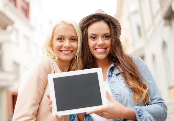 Beautiful girls with blank tablet pc screen — Stock Photo, Image