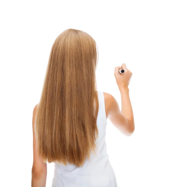 Girl in blank white shirt drawing something — Stock Photo, Image