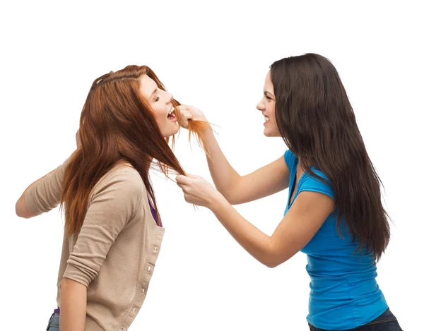 Two teenagers having a fight and getting physical — Stock Photo, Image
