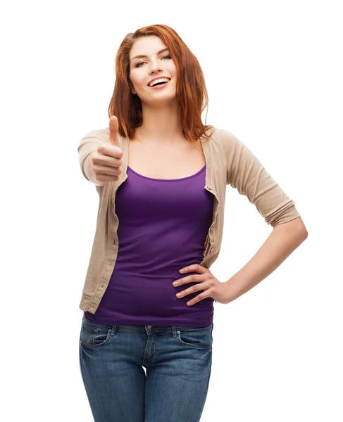 Smiling girl in casual clothes showing thumbs up — Stock Photo, Image