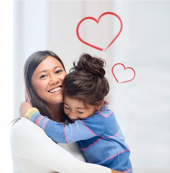 Hugging mother and daughter — Stock Photo, Image