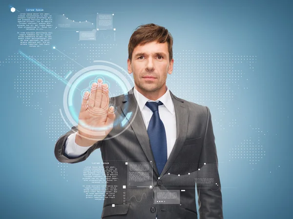 Attractive buisnessman working with virtual screen — Stock Photo, Image