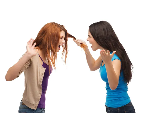 Two teenagers having a fight and getting physical — Stock Photo, Image