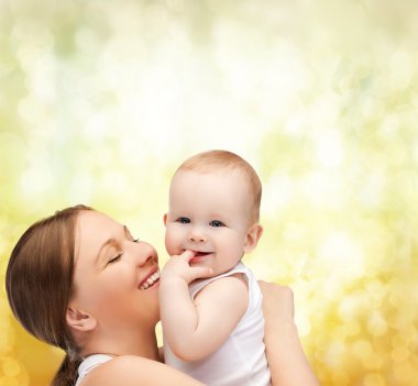Happy mother with adorable baby clipart