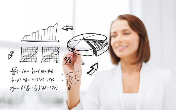 Businesswoman writing chart on virtual screen — Stock Photo, Image