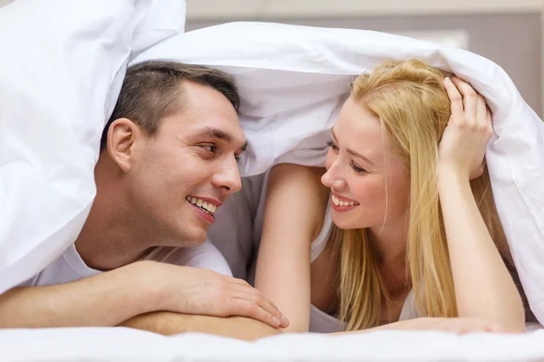 Happy couple sleeping in bed — Stock Photo, Image