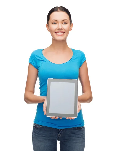 Chica sonriente con pantalla de PC tableta en blanco Fotos de stock libres de derechos