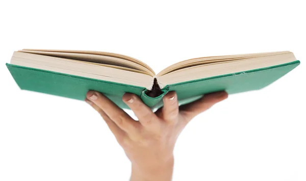 Close up of woman hand holding open book — Stock Photo, Image