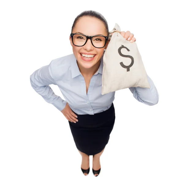 Happy businesswoman holding money bag with dollar — Stock Photo, Image