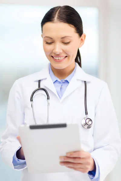 Young doctor with tablet pc and sthethoscope — Stock Photo, Image