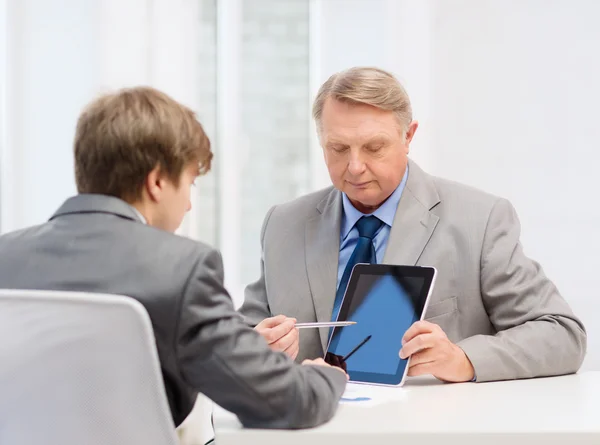 Older man and young man with tablet pc — Stock Photo, Image