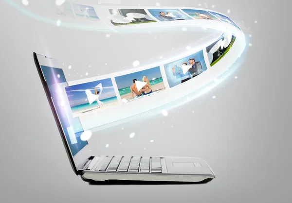 Laptop computer with video on screen — Stock Photo, Image