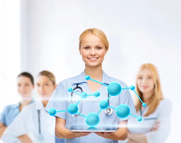 Smiling female doctor or nurse with tablet pc — Stock Photo, Image