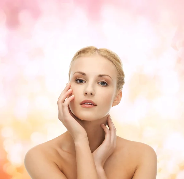 Woman touching her face skin — Stock Photo, Image