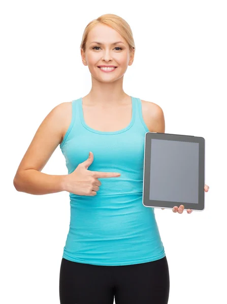 Sportovní žena s prázdnou obrazovkou počítače tablet pc — Stock fotografie