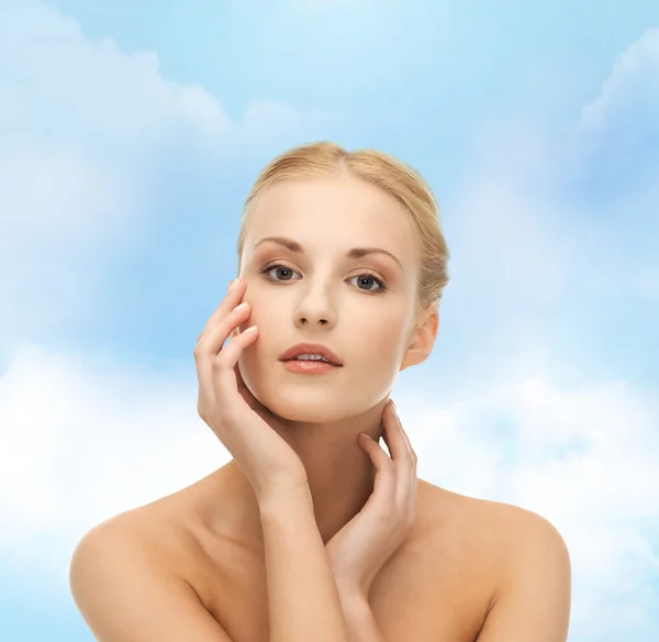 Woman touching her face skin — Stock Photo, Image