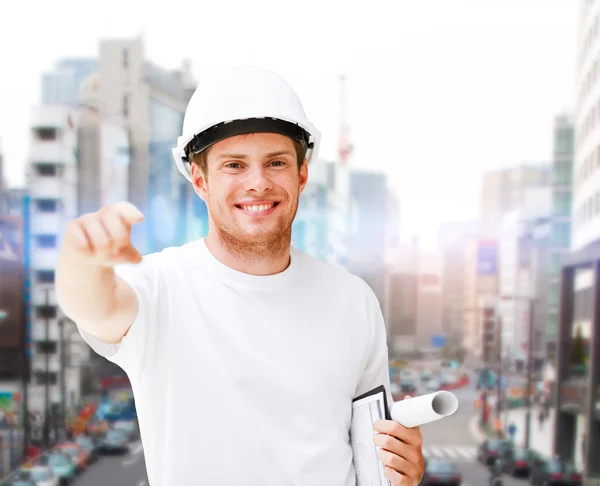 Male architect in helmet pointing at you — Stock Photo, Image