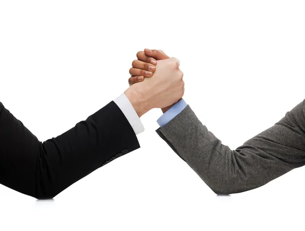 Businessman and businesswoman wretsling on table — Stock Photo, Image