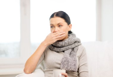 Ill woman with flu at home clipart
