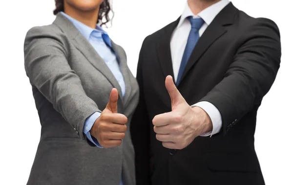 Hombre de negocios y mujer de negocios mostrando pulgares hacia arriba —  Fotos de Stock