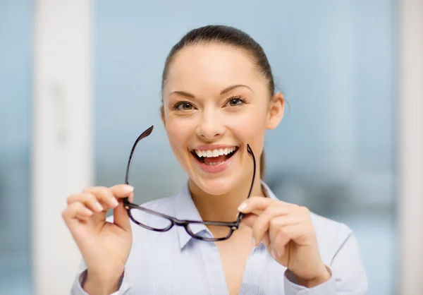 Laughing businesswoman with glasses — Stock Photo, Image