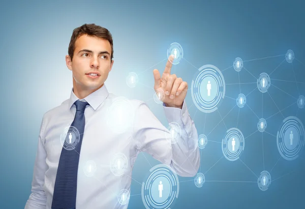 Businessman working with imaginary virtual screen — Stock Photo, Image