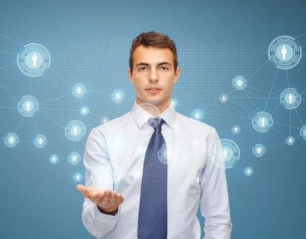 Man showing network on the palm of his hand — Stock Photo, Image