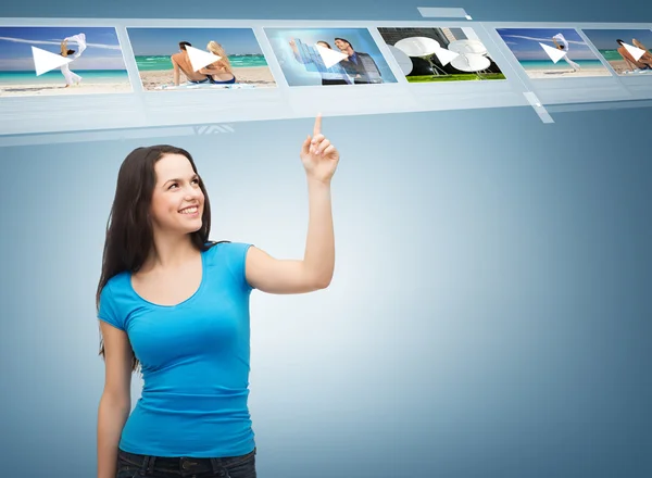 Smiling teenager pointing her finger videos — Stock Photo, Image