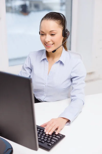 Friendly female helpline operator — Stock Photo, Image