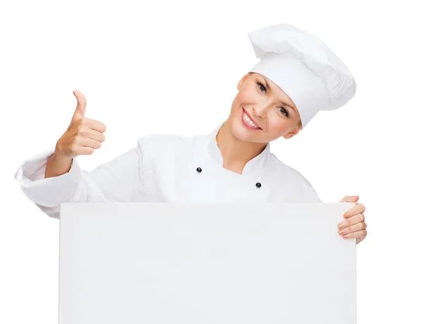 Chef sonriente con pizarra blanca en blanco — Foto de Stock