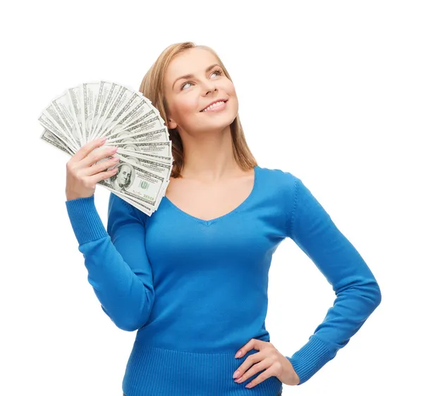 Menina sorridente com dinheiro em dinheiro dólar — Fotografia de Stock