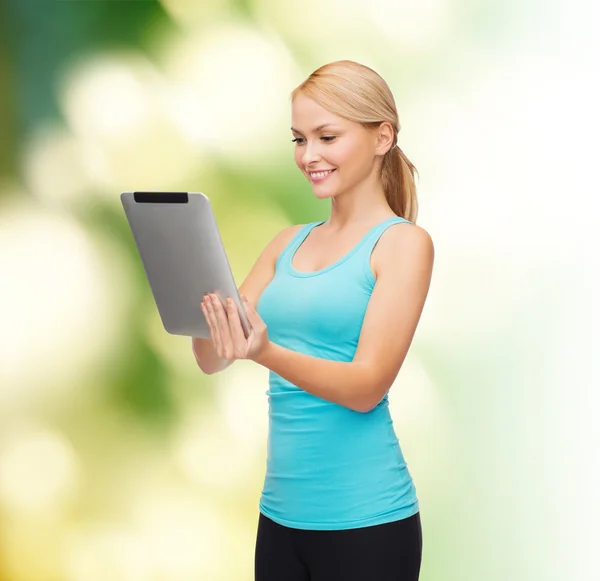 Sporty woman with tablet pc — Stock Photo, Image