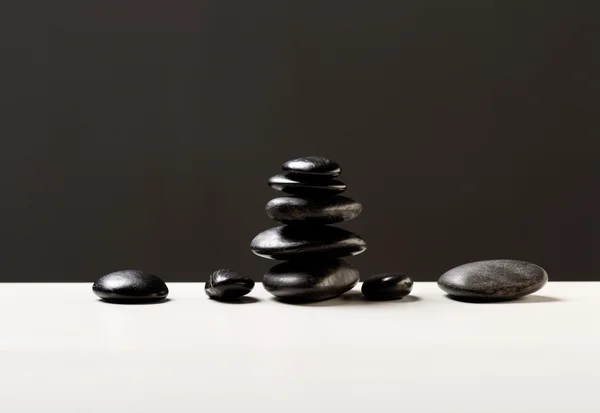 Zbliżenie masaż gorącymi kamieniami — Zdjęcie stockowe
