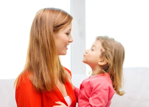 Hugging mother and daughter — Stock Photo, Image