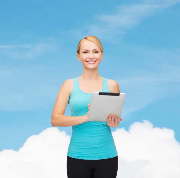 Mujer deportiva con tableta pc —  Fotos de Stock