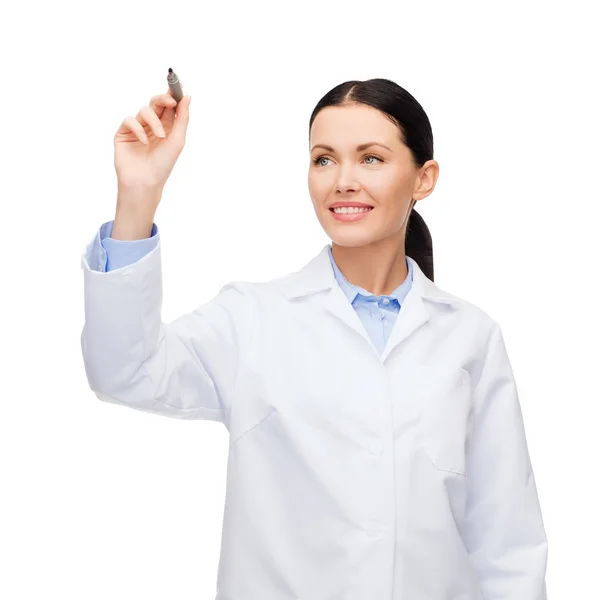 Female doctor working with something imaginary — Stock Photo, Image