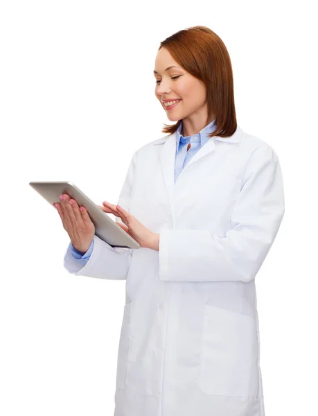 Sorridente medico femminile e tablet pc computer — Foto Stock