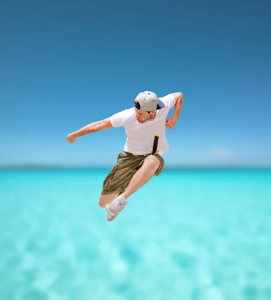 Male dancer jumping in the air — Stock Photo, Image