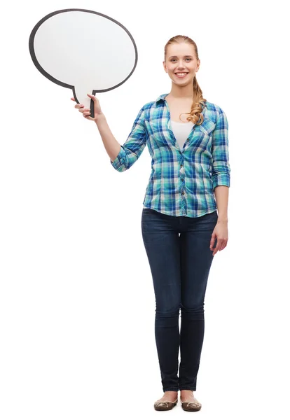 Smiling young woman with blank text bubble — Stock Photo, Image