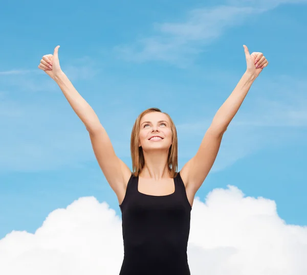 Woman in blank black tank top showing thumbs up — Stock Photo, Image