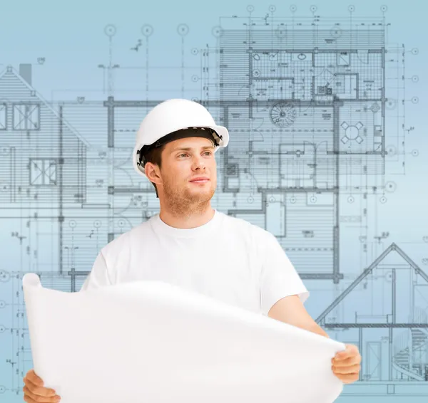 Male architect looking at blueprint — Stock Photo, Image