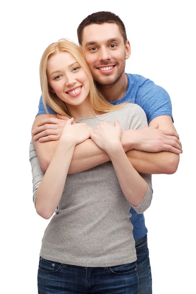 Smiling couple hugging Stock Picture